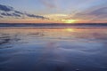 Reflections and sunset at Pangandaran beach
