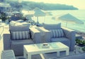 Beautiful relax terrace with armchairs on sea coast, Grete, Greece.