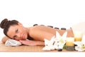 relaxing woman with stones on her back in a Spa Royalty Free Stock Photo