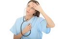 Beautiful Relieved Concerned Young Female Doctor Listening To Her Own Heartbeat Through Stethoscope Royalty Free Stock Photo