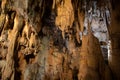 A beautiful Resava cave (Resavska pecina) in Serbia, massive columns of stalagmites and stalactites on the cave bottom.