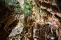 A beautiful Resava cave (Resavska pecina) in Serbia, massive columns of stalagmites and stalactites on the cave bottom.