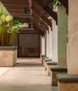 Beautiful resort exterior detail, columns, tropical plants