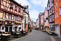 Restaurant lined street of half timbered buildings, Old Town, Bernkastel Kues, Germany Royalty Free Stock Photo