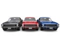 Beautiful restored vintage American muscle cars - blue, red and black