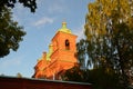 Beautiful Resurrection Skete of the Valaam Monastery. Horizontal photo of a red brick temple at sunset Royalty Free Stock Photo