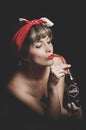 Beautiful retro girl holding an old vintage coca