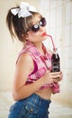 Beautiful retro girl holding an old vintage coca