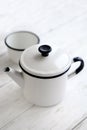 Beautiful retro home enamelware: mugs and coffee pots Royalty Free Stock Photo