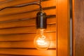 Beautiful retro luxury light lamp decor glowing.Decorative bulbs in vintage style Edison.Garland Light Bulb.Evening Wooden Stage Royalty Free Stock Photo