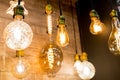 Beautiful retro luxury light lamp decor glowing.House interior of loft and rustic style. vintage light bulb hanging Royalty Free Stock Photo