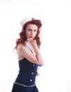 Beautiful retro pin-up girl in a sailor style dress