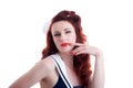 Beautiful retro pin-up girl in a sailor style dress Royalty Free Stock Photo