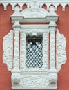 Beautiful retro window on red brick wall.