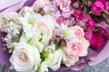 Beautiful wedding bouquet, flowers arrangement by florist with white and pink roses and lilac close up Royalty Free Stock Photo