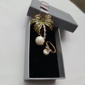 Beautiful ring and brooch jewelry with a beautiful box
