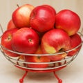 Beautiful ripe apples lie in a plate Royalty Free Stock Photo