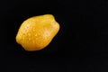 Beautiful ripe yellow pear on black background Royalty Free Stock Photo