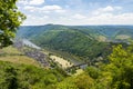 Beautiful, ripening vineyards in the spring season in western Germany, the Moselle river flowing between the hills. Visible railwa Royalty Free Stock Photo