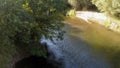 A beautiful river that appears behind the treetops