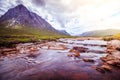 Beautiful river mountain landscape scenery in Glen Coe, Scottish Highlands, Scotland. Sunshine Royalty Free Stock Photo