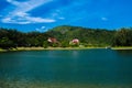 Beautiful river park trees green grass over blue sky Royalty Free Stock Photo