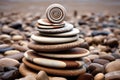 beautiful river stones stacked in a spiral pattern