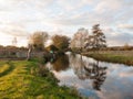 Beautiful river stour lake autumn trees reflection countryside Royalty Free Stock Photo