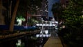 Beautiful Riverwalk in San Antonio with its small restaurants and pubs along the river - view by night - SAN ANTONIO Royalty Free Stock Photo