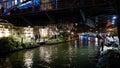Beautiful Riverwalk in San Antonio with its small restaurants and pubs along the river - view by night - SAN ANTONIO Royalty Free Stock Photo