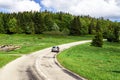 Beautiful road in green fields, natural landscape Royalty Free Stock Photo