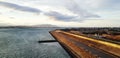 The beautiful road, highway, route, way beside sea or ocean with cloud and sky background. Royalty Free Stock Photo