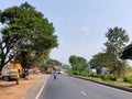 Beautiful road landscape image with vehicles and full of greenery from village in India Royalty Free Stock Photo