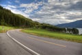 Beautiful mountain road landscape blue sky summer travel empty highway nature asphalt green forest trees Norway rural way journey