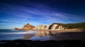 Beautiful rock formations on Playa de Portio, Cantabria, Spain Royalty Free Stock Photo