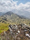 Beautiful rock structure with background blur of Indian Himalayas Royalty Free Stock Photo
