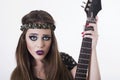 Beautiful rocker punk girl with colorful makeup