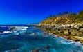 Beautiful rocks cliffs view waves at beach Puerto Escondido Mexico