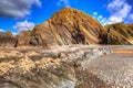 Beautiful rocks with unusual patterns Sandymouth beach North Cornwall England UK in colourful HDR