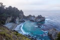 Beautiful rocky coastline with a scenic view of a McWay Falls in  Big Sur, California Royalty Free Stock Photo