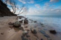 Beautiful rocky sea shore at sunrise or sunset. Royalty Free Stock Photo