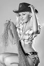 Beautiful rodeo girl wearing a cowboy hat Royalty Free Stock Photo