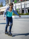 Beautiful Roller Girl is learning how to skate