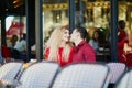 Beautiful romantic couple in Parisian outdoor cafe Royalty Free Stock Photo