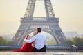 Couple near the Eiffel tower in Paris, France Royalty Free Stock Photo