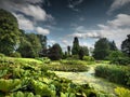 Beautiful romantic gothic castle in Cholmondeley with the most beautiful gardens and interesting park Royalty Free Stock Photo