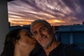 beautiful romantic middle aged couple taking a selfie on the outdoor terrace Royalty Free Stock Photo