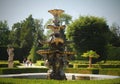 Beautiful romantic park with interesting fountains and flowers in the background Royalty Free Stock Photo