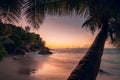 Beautiful romantic sunset sundown colorful sky on Seychelles paradise island. Dream white sand beach and palmtree in the Royalty Free Stock Photo