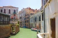 Beautiful romantic Venetian cityscape with canal in Italy